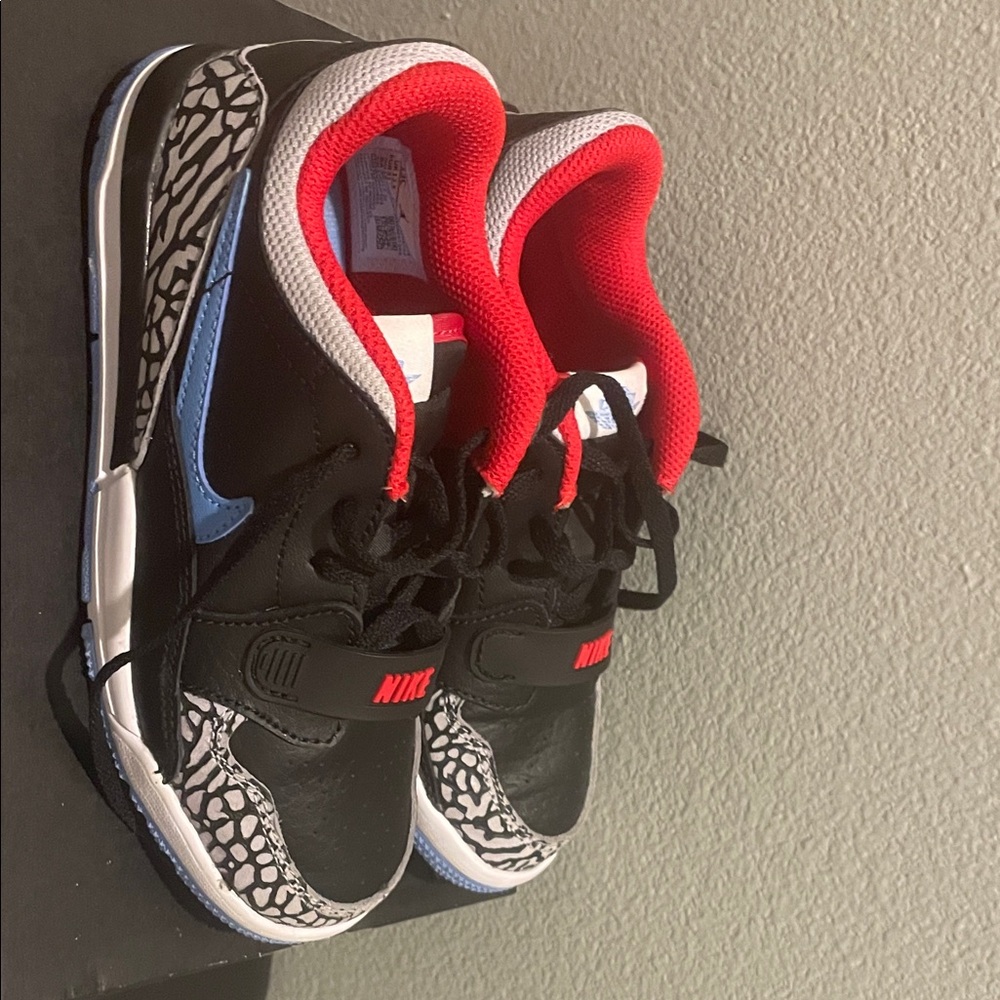 Jordan Kids Black and Red Sneakers with Blue Accents